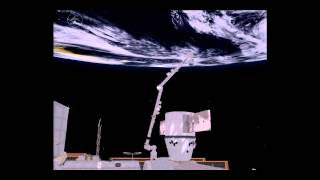 Dragons Delivery Canadarm2 unpacks the capsules cargo [upl. by Crooks373]