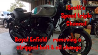 Removing a stripped bolt and an oil change on a Royal Enfield [upl. by Khudari618]