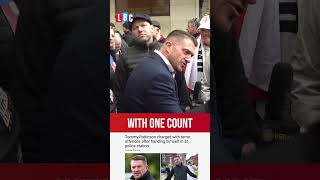 Tommy Robinson charged under Terrorism Act as he hands himself into police  LBC [upl. by Lan457]