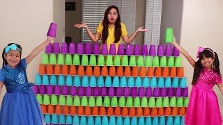 Emma amp Jannie Pretend Play Fun Stacking Giant Cup Wall Challenge Kids Toys [upl. by Ennovi]