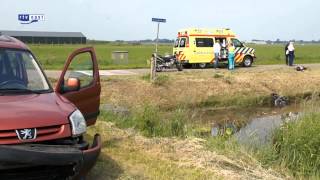 Motor belandt na aanrijding in het water bij Hasselt [upl. by Davidde507]