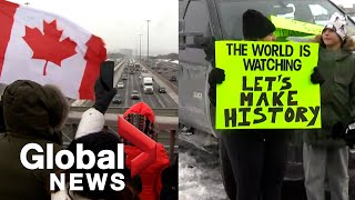 Trucker convoy People line bridges in Greater Toronto Area as trucks roll through [upl. by Hcirdeirf]