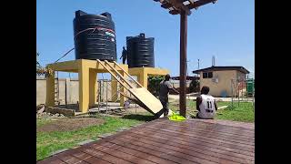 DIY 10000 Liter Polytank Installation with NO CRANE in GHANA [upl. by Ivett828]