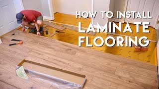 Installing Laminate Flooring For The First Time  Home Renovation [upl. by Aremihc]