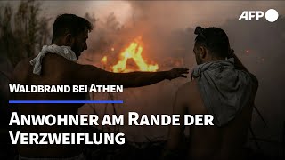 quotDas Feuer kommt von überallquot Anwohner entsetzt über Waldbrand bei Athen  AFP [upl. by Liggett]