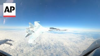 Video shows Russian jet flying within feet of US F16 near Alaska [upl. by Devol997]