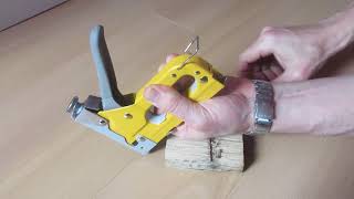 How to load a staple gunTACKER [upl. by Ssilb]