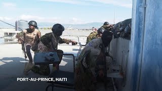 Kenyan police forces exchange gun fire with gangs in Haiti [upl. by Ahsinal]