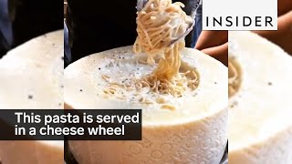 This pasta is served in a giant cheese wheel [upl. by Marlowe]