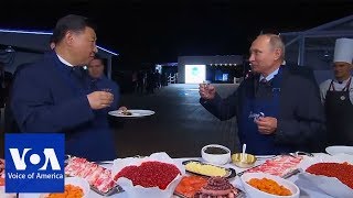 Putin and Xi make pancakes  VOANews [upl. by Erreid]