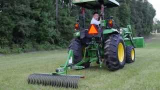 John Deere 4R Series vs Kubota L6060  Attachability [upl. by Lekkim]