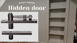 Hidden door Bookcase with TamBee Pivot hinges [upl. by Rambert]