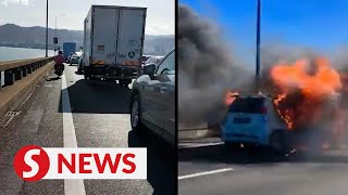 Burning car on Penang Bridge causes massive jam [upl. by Duvall170]