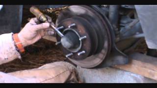 Replace pads and rotors on Toyoto T 100wmv [upl. by Vanderhoek]