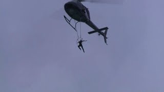 Erendira Wallenda hangs by teeth from chopper over Niagara Falls [upl. by Ihskaneem]