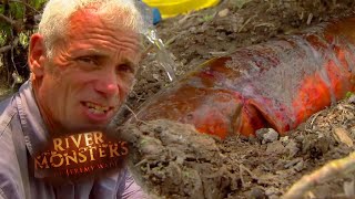 Catching A Giant Electric Eel With Rubber Gloves  EEL  River Monsters [upl. by Hartley]