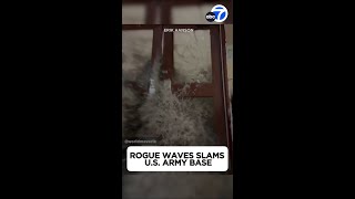 Rogue wave crashes into US Army Base ripping doors from hinges [upl. by Eemak]