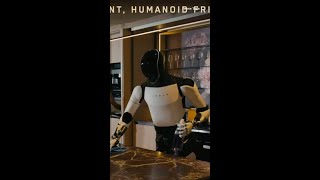 Elon Musk Shows Off Teslas Humanoid Robot Optimus at We Robot Event  TechCrunch [upl. by Ynohta664]