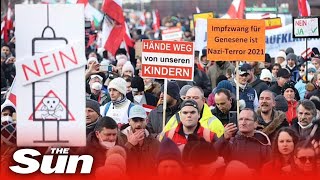 COVID19  Austrians protest mandatory vaccine amp fines saying we have to win this now [upl. by Oina]