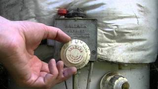 How To Change The Temperature On A Gas Water Heater [upl. by Seuqram]