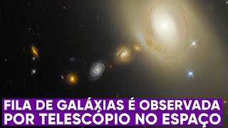 Telescópio revela fila de galáxias no espaço [upl. by Nagiam]