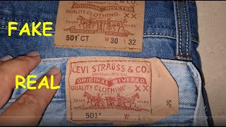 Real vs fake Levis Jeans How to spot fake Levis 501 jeans denim [upl. by Enajiram]