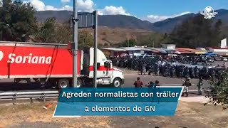 Lanzan normalistas de Ayotinapa tráiler sin frenos contra GN y policías tras enfrentamiento [upl. by Lime]