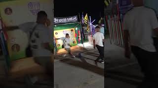 Guy Kicking Soccer Ball at Carnival Game Misses the Mark  ViralHog [upl. by Dilahk]