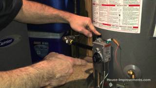 How To Light A Gas Water Heater Pilot Light [upl. by Bolan]