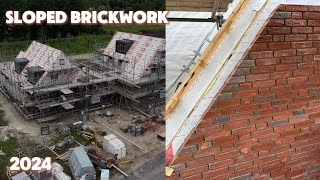 Bricklaying SLOPED brickwork POV [upl. by Erodroeht384]