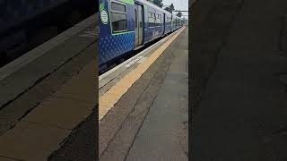 ScotRail 320302 arriving at Hillington East 16524 [upl. by Ilahsiav]