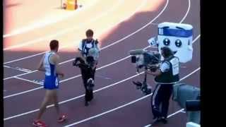 Olympic Runner Mahiedine Mekhissi Benabbad pushes 14 year old Girl Mascot [upl. by Newfeld]