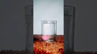 Glass of splashing water with toy fruti Cherries water [upl. by Sabino332]