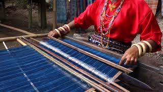 Weaving on a backstrap loom with a reed by Kay Faulkner Flores Indonesia [upl. by Omidyar]