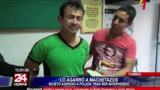 Furibundo sujeto ataca con un machete a policía que lo intervino 12 [upl. by Jerman]