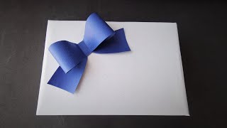 Schleife aus Geschenkpapier um Geschenke einzupacken  DIY Geschenkschleife basteln  simple bow [upl. by Dedra]