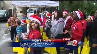 Childrens choir sings for those waiting in line for free turkeys [upl. by Ardnal]