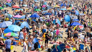 Britons enjoy Bank Holiday sunshine on hottest day of the year so far [upl. by Eriuqs]