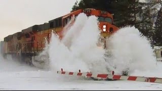 BNSF Train Crashes Through Big Snowdrift [upl. by Gilchrist]