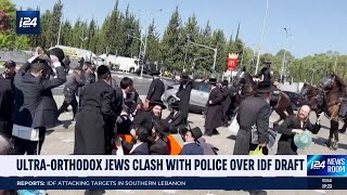 UltraOrthodox Jews riot outside of main IDF drafting center [upl. by Pirzada90]