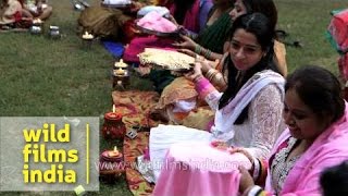 Ladies pass their thalis around in circle  Karva Chauth rituals [upl. by Hgielime624]