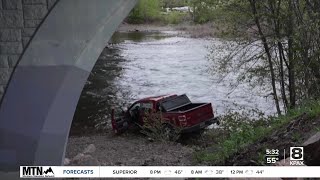 Missoula PD quotImpairmentquot suspected after pickup lands in Clark Fork River [upl. by Macfarlane913]