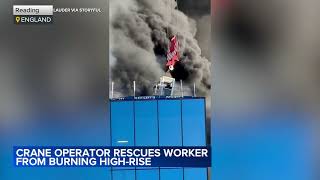 Crane operator rescues man from burning highrise in England [upl. by Amby]