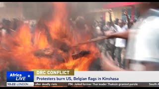 DR Congo protesters burn US and Belgian flags in Kinshasa [upl. by Idnor]