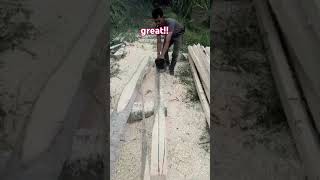 split the wood very quickly Indonesian forest boy automobile chainsaw woodworking [upl. by Tann504]