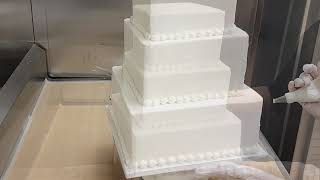 How to cut and stack a square wedding cake [upl. by Ahsakal]