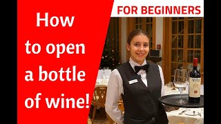 How to open a bottle of wine with a wine opener Wine service Waiter training Restaurant service [upl. by Whitford]