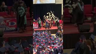 Student throws money from the stage during graduation [upl. by Eel]