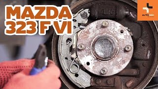 Come sostituire freni a tamburo posteriori e pastiglie freni su MAZDA 323 TUTORIAL  AUTODOC [upl. by Dominik]