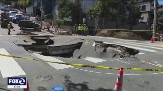 Giant sinkhole opens up after San Francisco water main break [upl. by Neltiak]